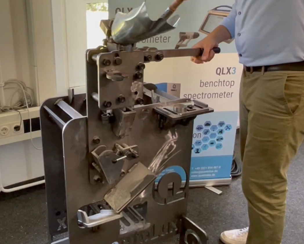 filling the slag sample into the manual crusher